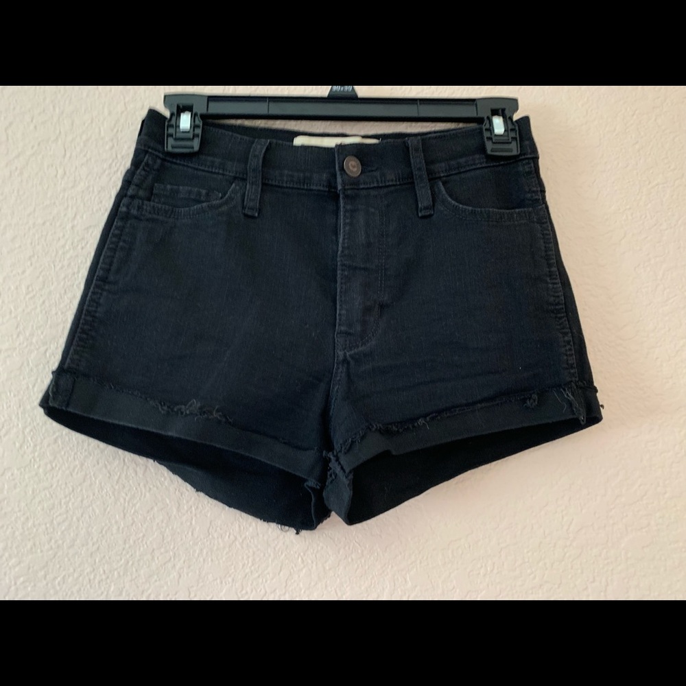Stretchy black denim shorts